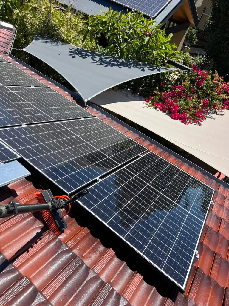 solar panel cleaning in progress after gutter cleaning and roof cleaning Perth